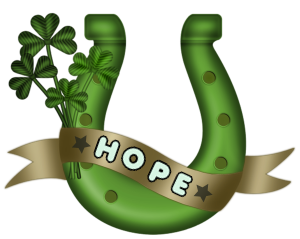 a horse shoe with shamrocks